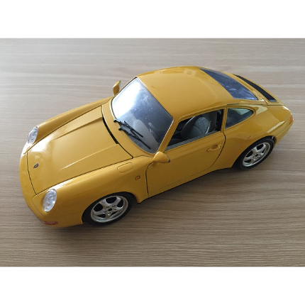 BURAGO PORSCHE 911 CARRERA 1993 JAUNE 1/18