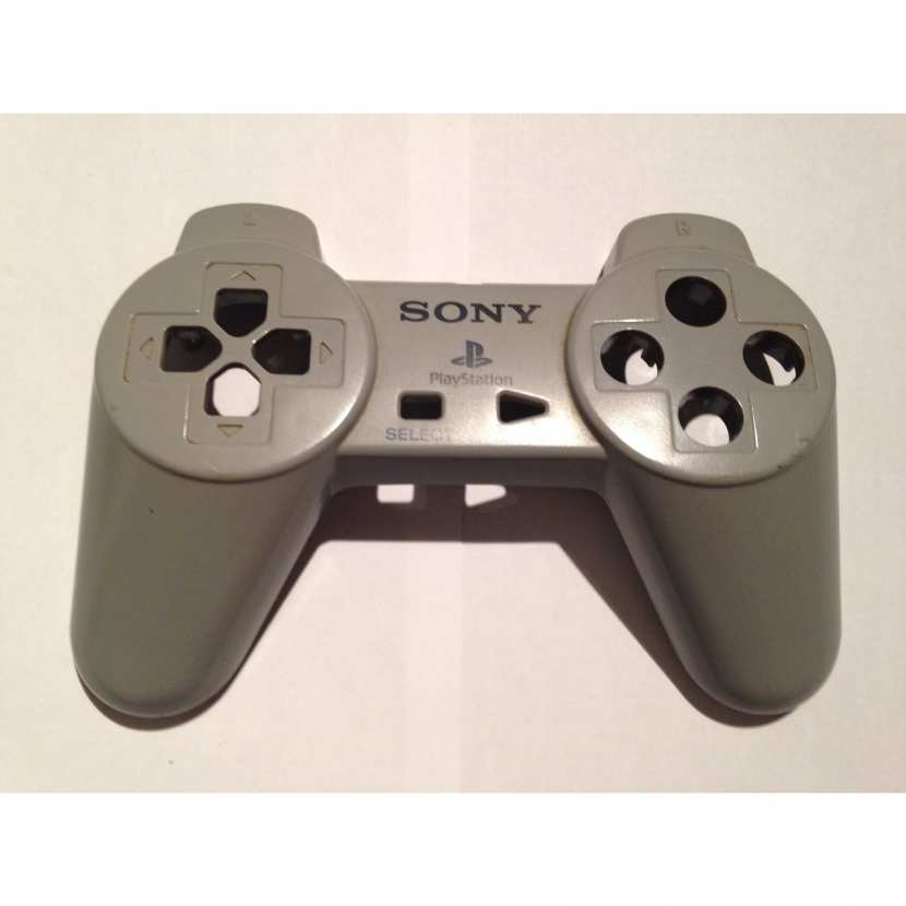 Plasturgie coque supérieur pièce détachée pour manette de console de jeu de marque sony type Playstation PS1 PS2 référence SCPH-1080